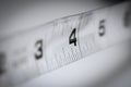 Number four inches on old measurement tape