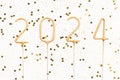 number 2024 and gold glitter on white isolated background. the concept of New Year, Christmas, greetings from business colleagues Royalty Free Stock Photo