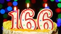 Number 166 Happy Birthday Cake With Burning Candles Topper.