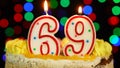 Number 69 Happy Birthday Cake Witg Burning Candles Topper.