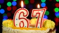 Number 67 Happy Birthday Cake Witg Burning Candles Topper.