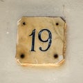 Number19 on house wall Royalty Free Stock Photo