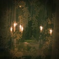 A number of lighted candles in bottles behind the transparent lace curtain Royalty Free Stock Photo