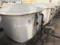 Number of 1000 liter capacity water tanks made of glass reinforced plastic kept over concrete bed with necessary Plumbing works