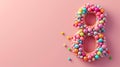 Number 8 made of colored caramel candies on a pink background, Womens Day
