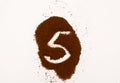 Number made of ground coffee isolated on white background Royalty Free Stock Photo