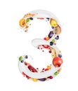 Number 3 made of milk splashes with fruits and berries, isolated on a white background Royalty Free Stock Photo