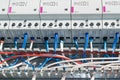 A number of modular contactors, cable channel and wire.