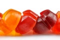A number of multicolored marmalade sweets on a white background Royalty Free Stock Photo