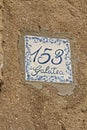 Number and name on a handmade tile details