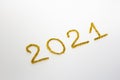 2021 number for New year greeting card. Christmas Party decoration on white background. Golden tinsel Royalty Free Stock Photo