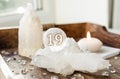 Number nineteen on gemstone sphere or crystal ball known as crystallum orbis or orbuculum. Natural clear quartz ball. Royalty Free Stock Photo