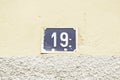 Number nineteen in a wall Royalty Free Stock Photo