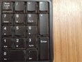 Number  The number keys on a computer keyboard on the wooden table background Royalty Free Stock Photo