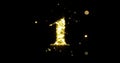 Number one glitter gold. Golden glittering number 1 with glister light shiny sparks on black background Royalty Free Stock Photo