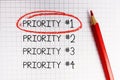 Number one priority marked with red circle on math notebook Royalty Free Stock Photo