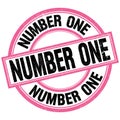 NUMBER ONE text on pink-black round stamp sign Royalty Free Stock Photo