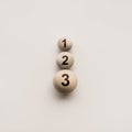 Number one; two; three; on wood circle ball,different size Royalty Free Stock Photo