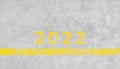 2022 number painted on grunge concrete background