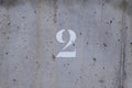 number 2 painted on a worn concrete wall Royalty Free Stock Photo