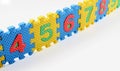 Number puzzles arranged in a row Royalty Free Stock Photo