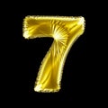 Number 7 seven made of gold balloon isolated on a black background.