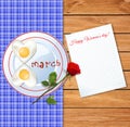 Number 8 shaped fried eggs on plate with ketchup letters and re