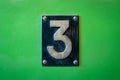 Number 3 sign - number three metal sign on green background