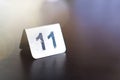 Number sign on restaurant table to show reservation. Royalty Free Stock Photo