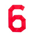 Number six made from red scotch tape on a white background Royalty Free Stock Photo