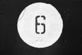 Number six on metal wall in black and white. Royalty Free Stock Photo