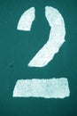 Number 2 in stencil on metal wall in cyan tone Royalty Free Stock Photo