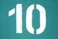 Number 10 in stencil on metal wall in cyan tone Royalty Free Stock Photo