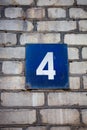 Number 4 on a stone  brick wall Royalty Free Stock Photo