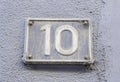 Number ten on the wall of a house Royalty Free Stock Photo