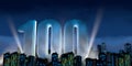 Number 100 in thick blue font lit from below with floodlights floating in the middle of a city center with tall buildings with