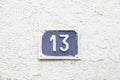 Number thirteen on a wall in a house Royalty Free Stock Photo