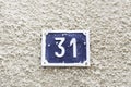 Number thirty-one on a wall Royalty Free Stock Photo