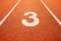Number three on running track Royalty Free Stock Photo