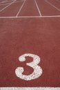 Number three signpost in an athletic running track Royalty Free Stock Photo