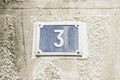 Number three on the wall of a house Royalty Free Stock Photo