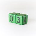 Number three written on a wooden green cube Royalty Free Stock Photo