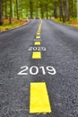 Number of 2019 to 2023 on asphalt road surface Royalty Free Stock Photo