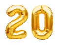 Number 20 twenty made of golden inflatable balloons isolated on white. Helium balloons, gold foil numbers. Party decoration, Royalty Free Stock Photo