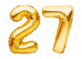 Number 27 twenty seven made of golden inflatable balloons isolated on white. Helium balloons, gold foil numbers. Party decoration Royalty Free Stock Photo