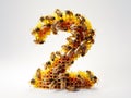 Number two made of honey comb Royalty Free Stock Photo