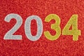 Number two thousand and thirty-four over a red background. Anniversary. Royalty Free Stock Photo
