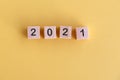 Number 2021 on wood block New Year concept