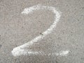 Number written with chalk on the pavement
