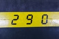 290 number on yellow stripe and black background Royalty Free Stock Photo